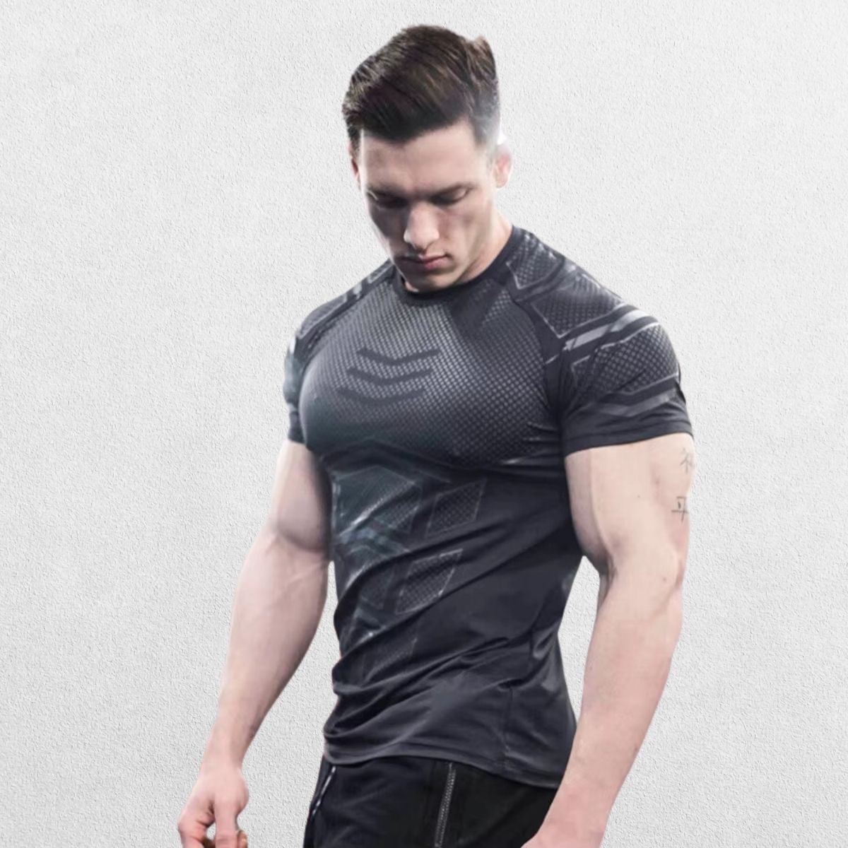 GPW Men’s Compression Quick-Dry T-Shirt in grey, highlighting the breathable fabric and compression fit.