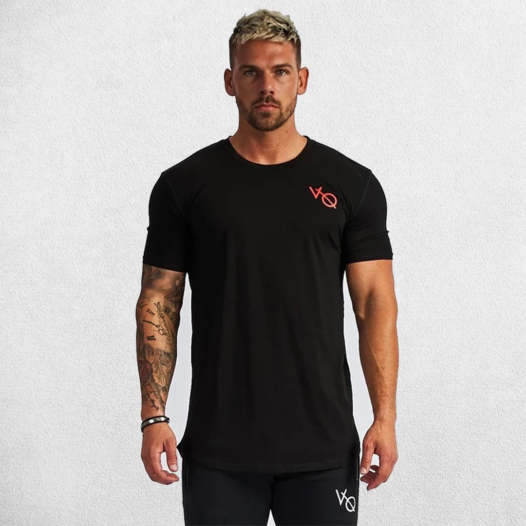 Model wearing black GPW Men's Cotton Slim Fit T-Shirt showcasing athletic fit