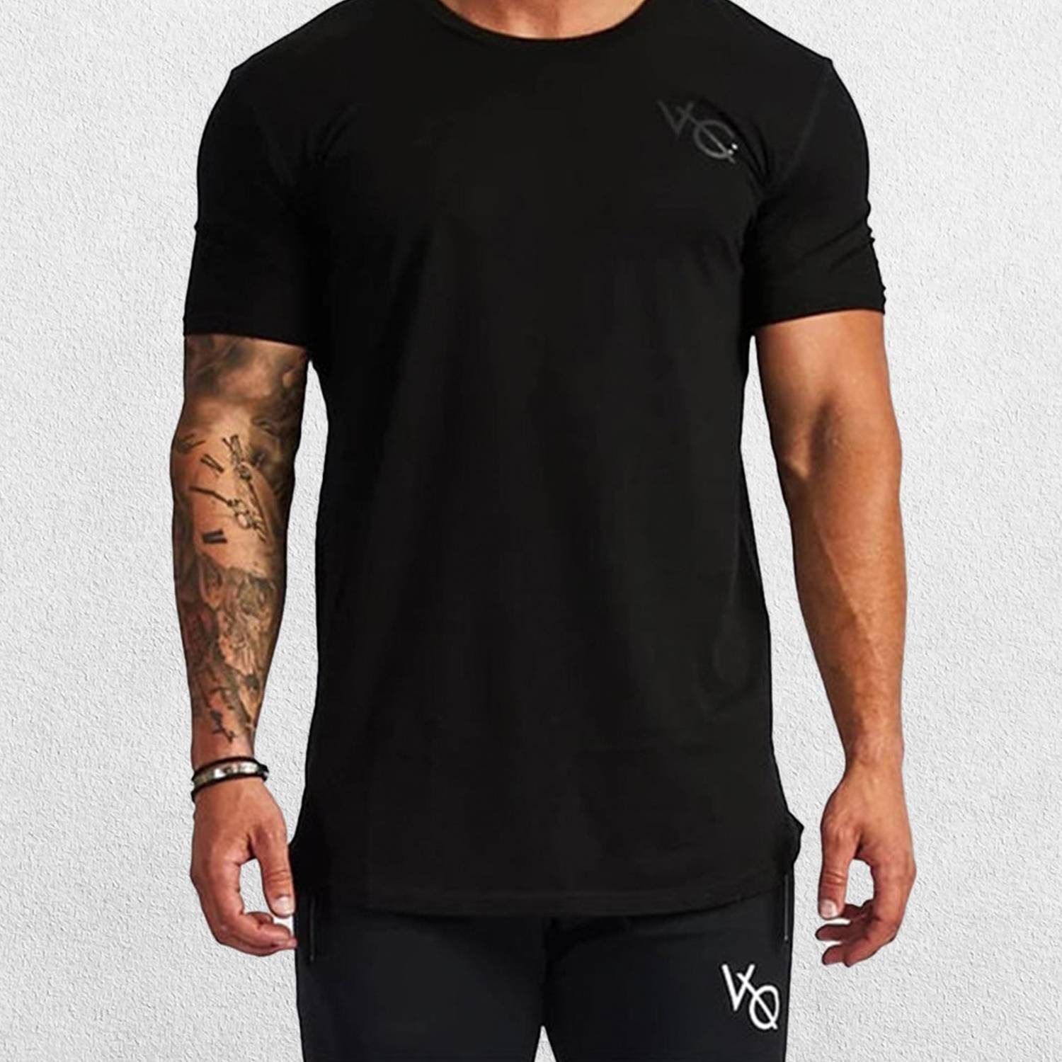 Model wearing Black moisture-wicking GPW slim fit t-shirt