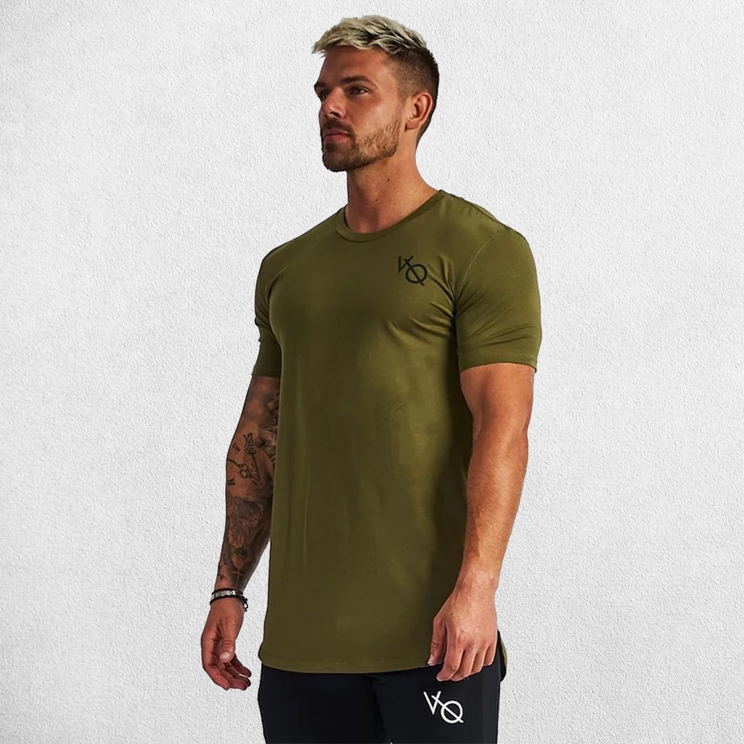 Model wearing moisture-wicking Grab Green GPW slim fit t-shirt during a workout