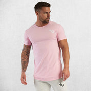 Model wearing pink GPW Men's Cotton Slim Fit T-Shirt showcasing athletic fit