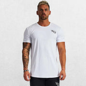 Model wearing moisture-wicking white GPW slim fit t-shirt during a workout