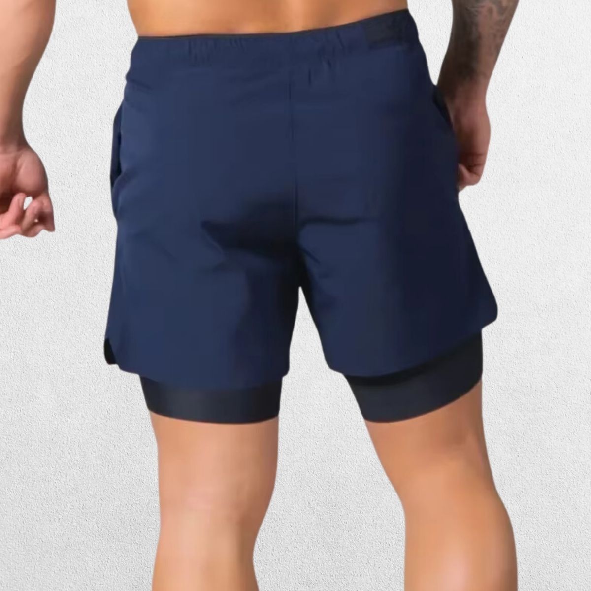 GPW Men's Double-Layered Gym Training Shorts in navy blue, back view displaying secure fit and sleek design.