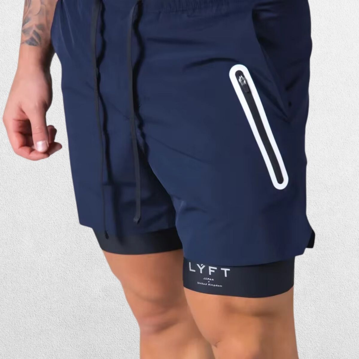 GPW Men's Double-Layered Gym Training Shorts in navy blue, front view showing lightweight design and adjustable waistband.