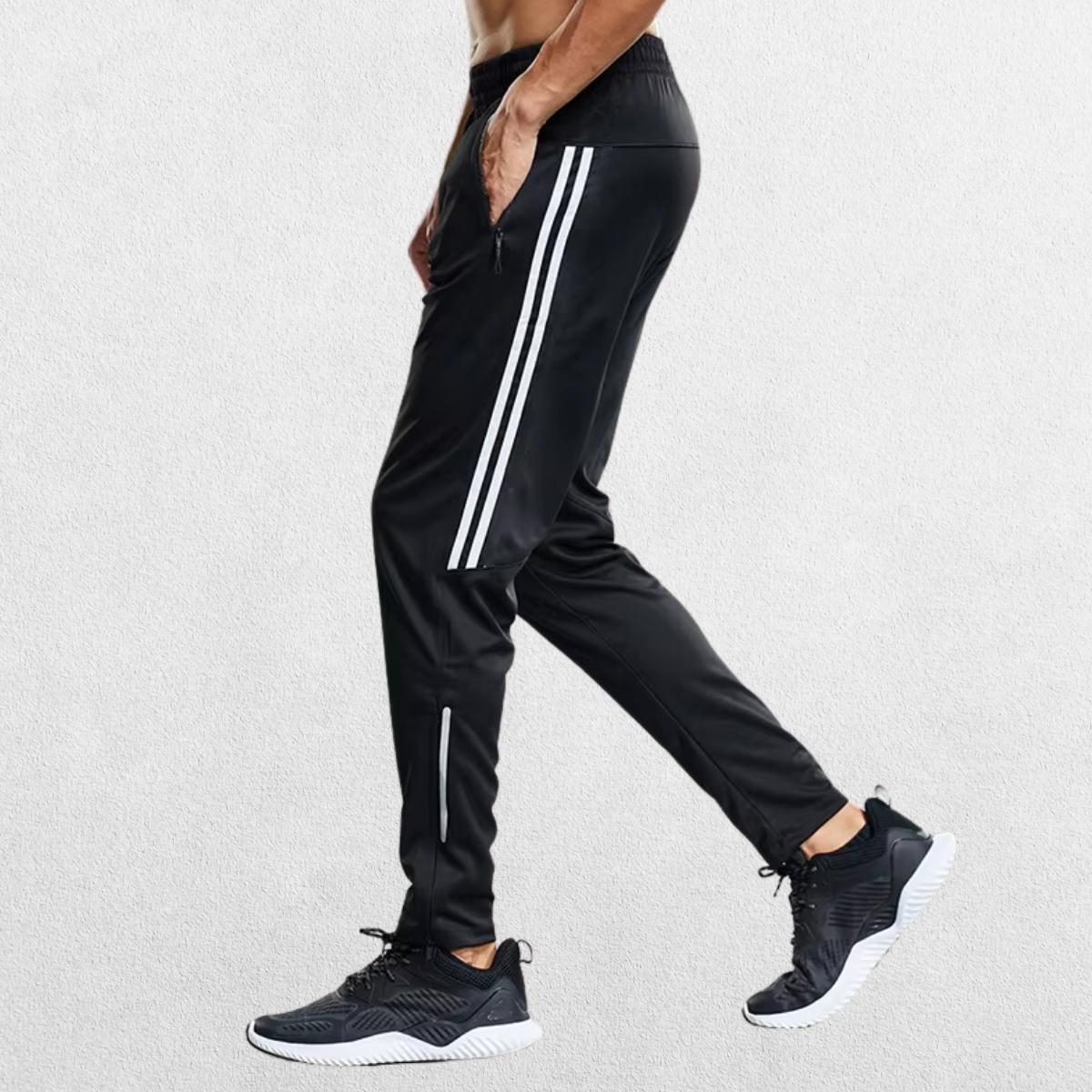 White GPW joggers with slim fit and sporty side accents.