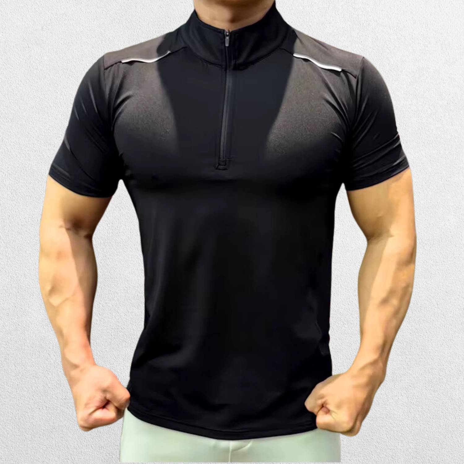 GPW Men's High-Performance Short Sleeve Training Shirt in black, front view highlighting the sleek athletic fit and moisture-wicking fabric against a clean studio background.