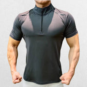 GPW Men's High-Performance Short Sleeve Training Shirt in grey, front view displaying the modern athletic style and lightweight fabric against a simple studio backdrop.