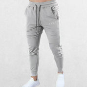 GPW men’s grey activewear pants with logo for summer fitness.