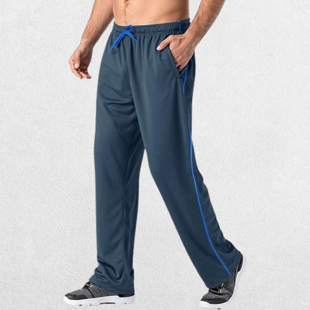 GPW Men’s Lightweight Loose Fit Open Bottom Mesh Athletic Trousers Blue Side View in Studio Background.