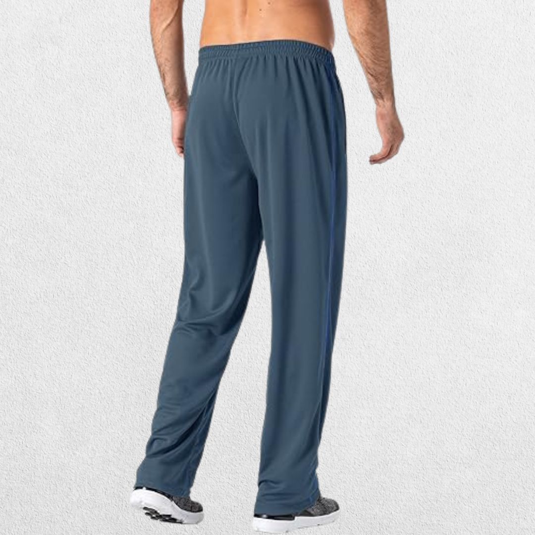 GPW Men’s Lightweight Loose Fit Open Bottom Mesh Athletic Trousers Blue Back View in Studio Background.