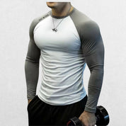 Front view of GPW Men's Long Sleeve Gym Grey Shirt with dual-color design and athletic fit