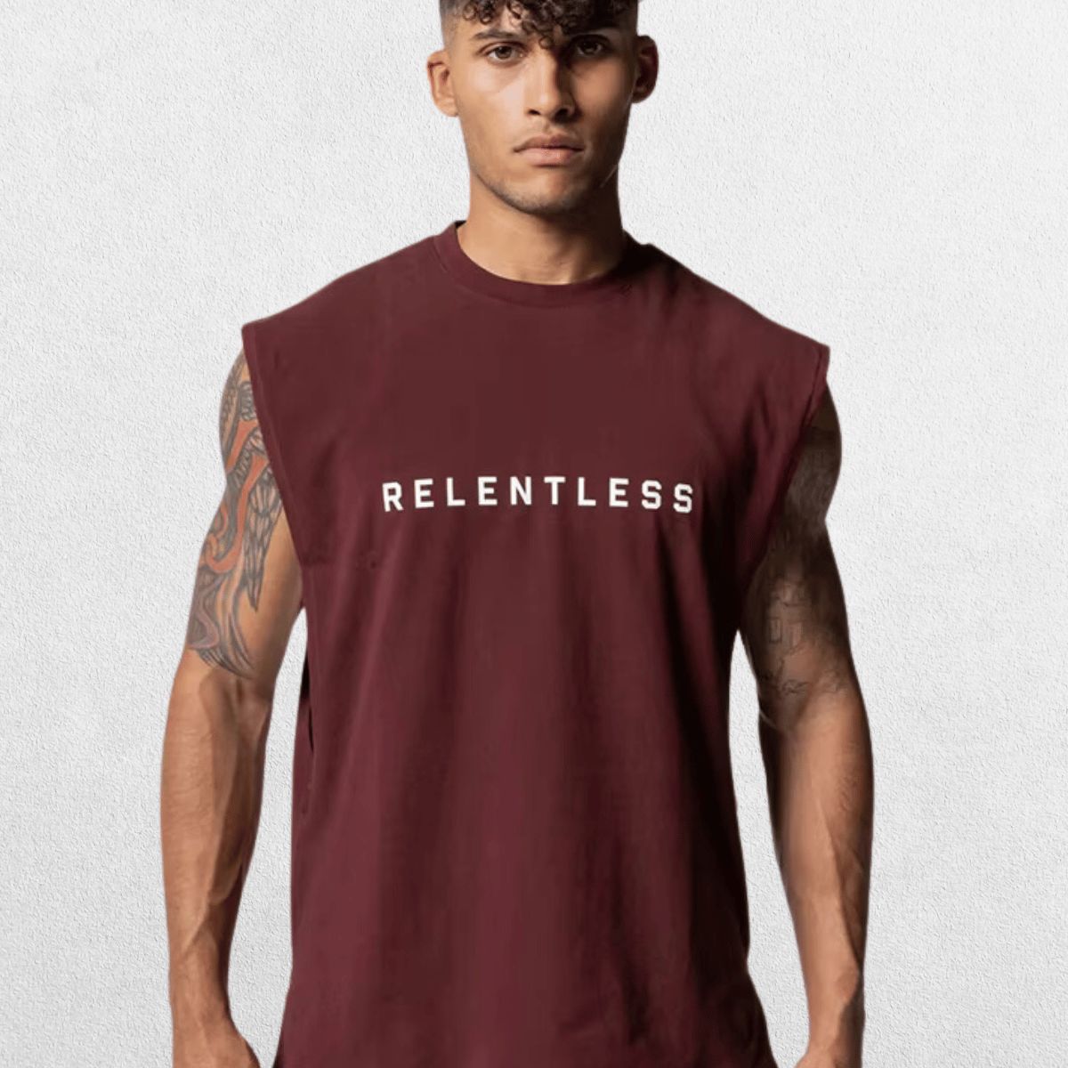 GPW Men's Performance Round Neck Sleeveless Shirt in burgundy, displayed from the front with a soft studio background that complements the rich color."