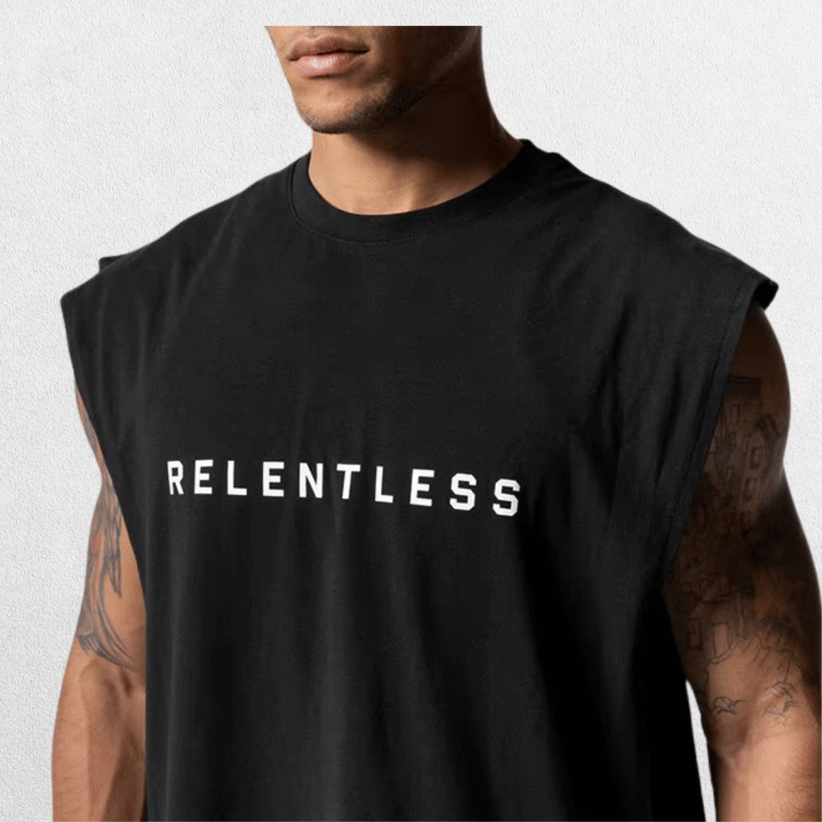 Close Up of GPW Men's Performance Round Neck Sleeveless Shirt in black, illustrating the clean design and fit with a calm studio backdrop.