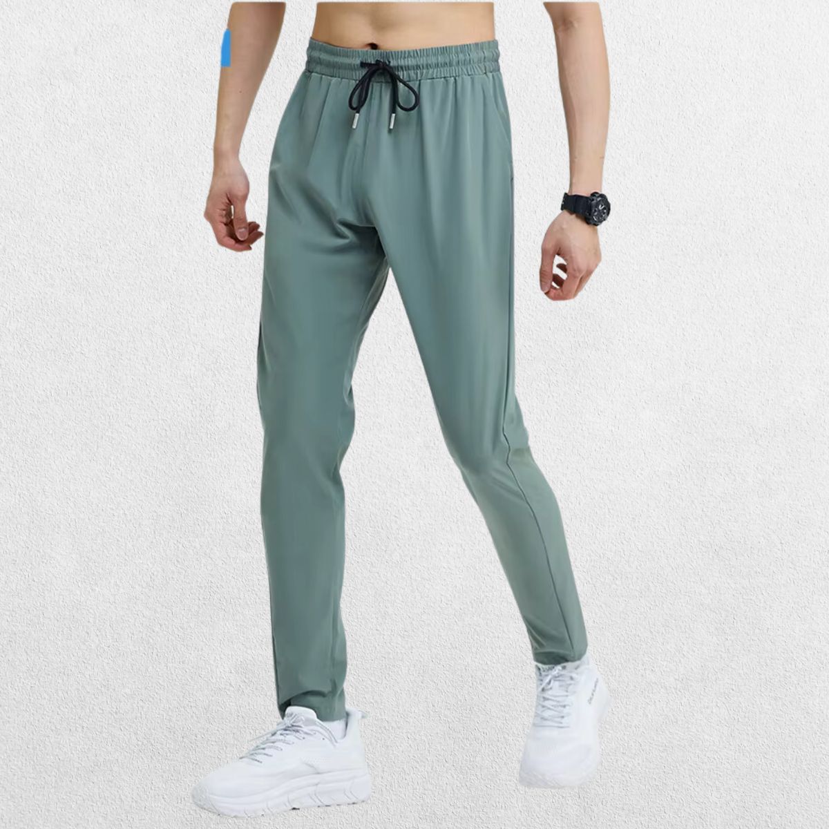 GPW Men's Slim Fit Pencil Pants in grey blue, front view highlighting the unique color and athletic fit against a clean studio setting.