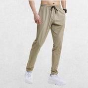 GPW Men's Slim Fit Pencil Pants in khaki, front view highlighting the versatile color and tailored fit against a professional studio background.\