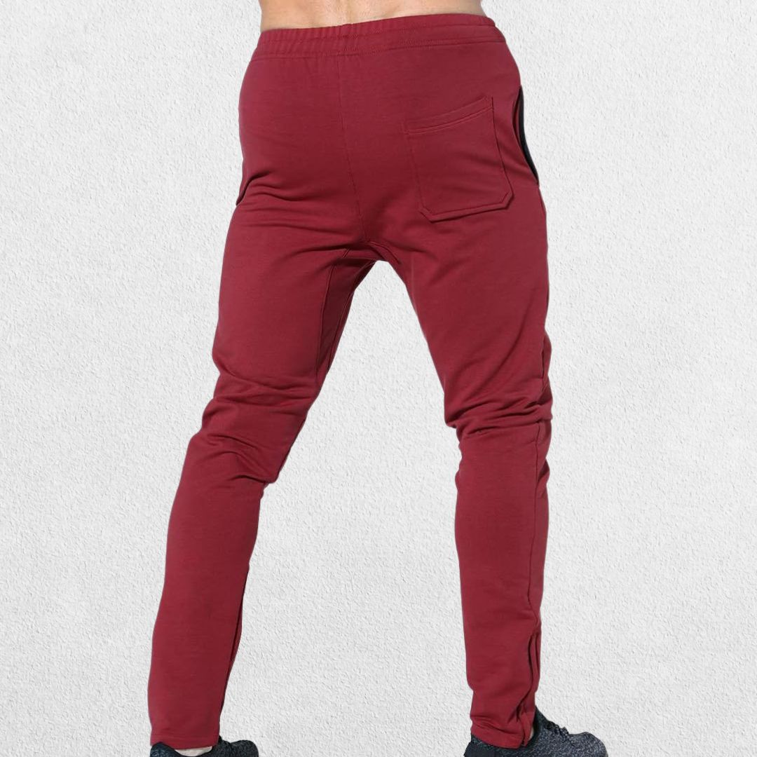 GPW Men’s Slim Fit Zip Athletic Pants Burgundy Back View in Studio Background