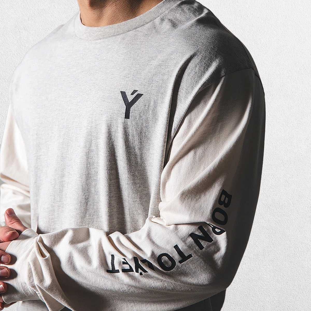 Light Grey Lightweight fabric close-up of GPW Long-Sleeved Gym Shirt