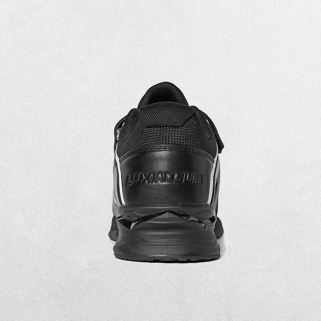 Black Nonslip hard rubber sole of GPW Deadlift Shoes providing traction on a gym floor.