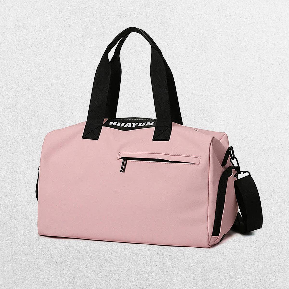 Pink Stylish gym bag in a studio setting.