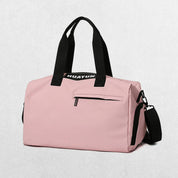 Pink Stylish gym bag in a studio setting.