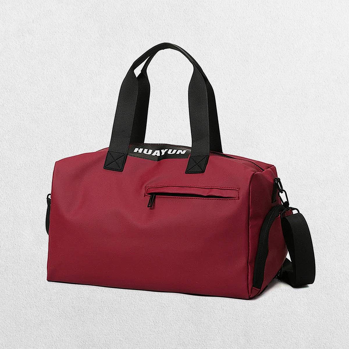 Red Stylish gym bag in a studio setting.
