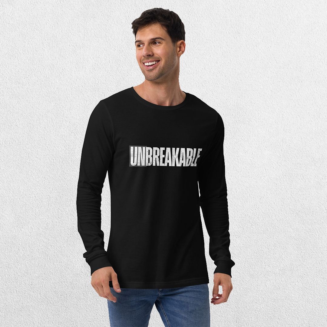 Model styling the GPW Black Unbreakable Tee with casual pants.