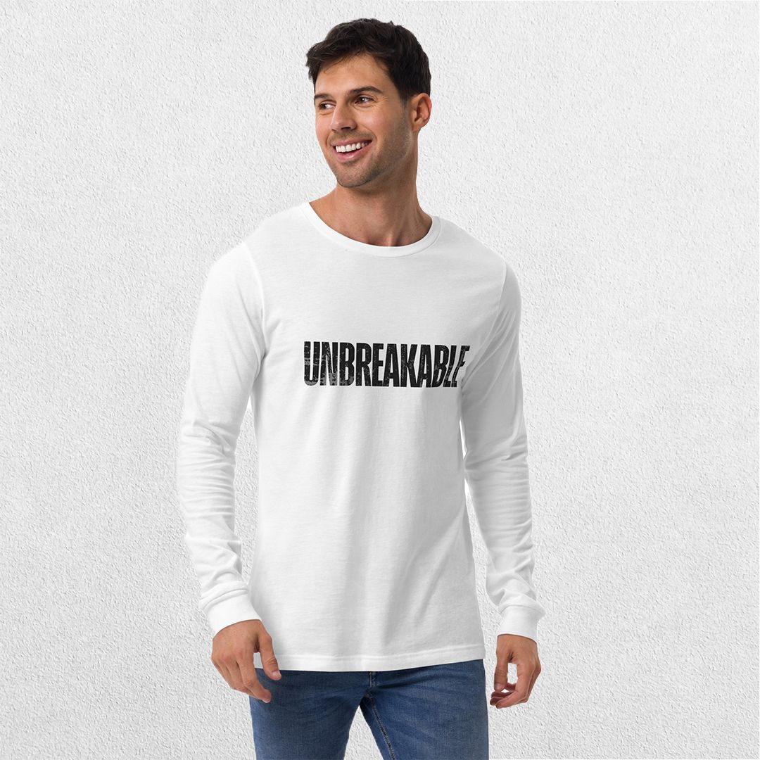 Model styling the GPW White Unbreakable Tee with casual pants.