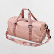 Close-up of pink GPW Waterproof Gym Bag