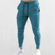 Blue GPW lightweight breathable pants with logo, ideal for summer activities