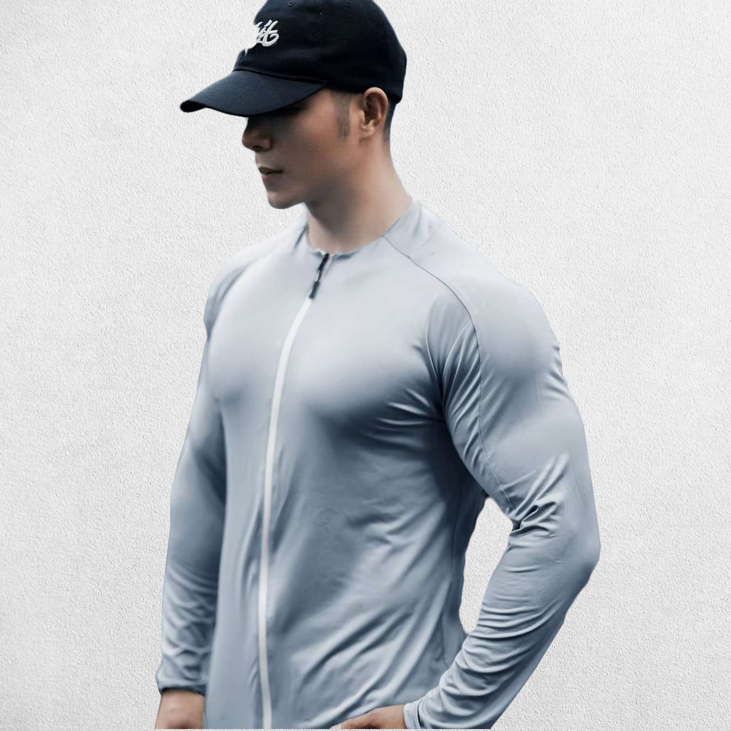 Grey Blue Men’s slim-fit compression shirt with zipper and stretch fabric, side profile.
