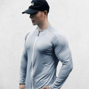 Grey Blue Men’s slim-fit compression shirt with zipper and stretch fabric, side profile.