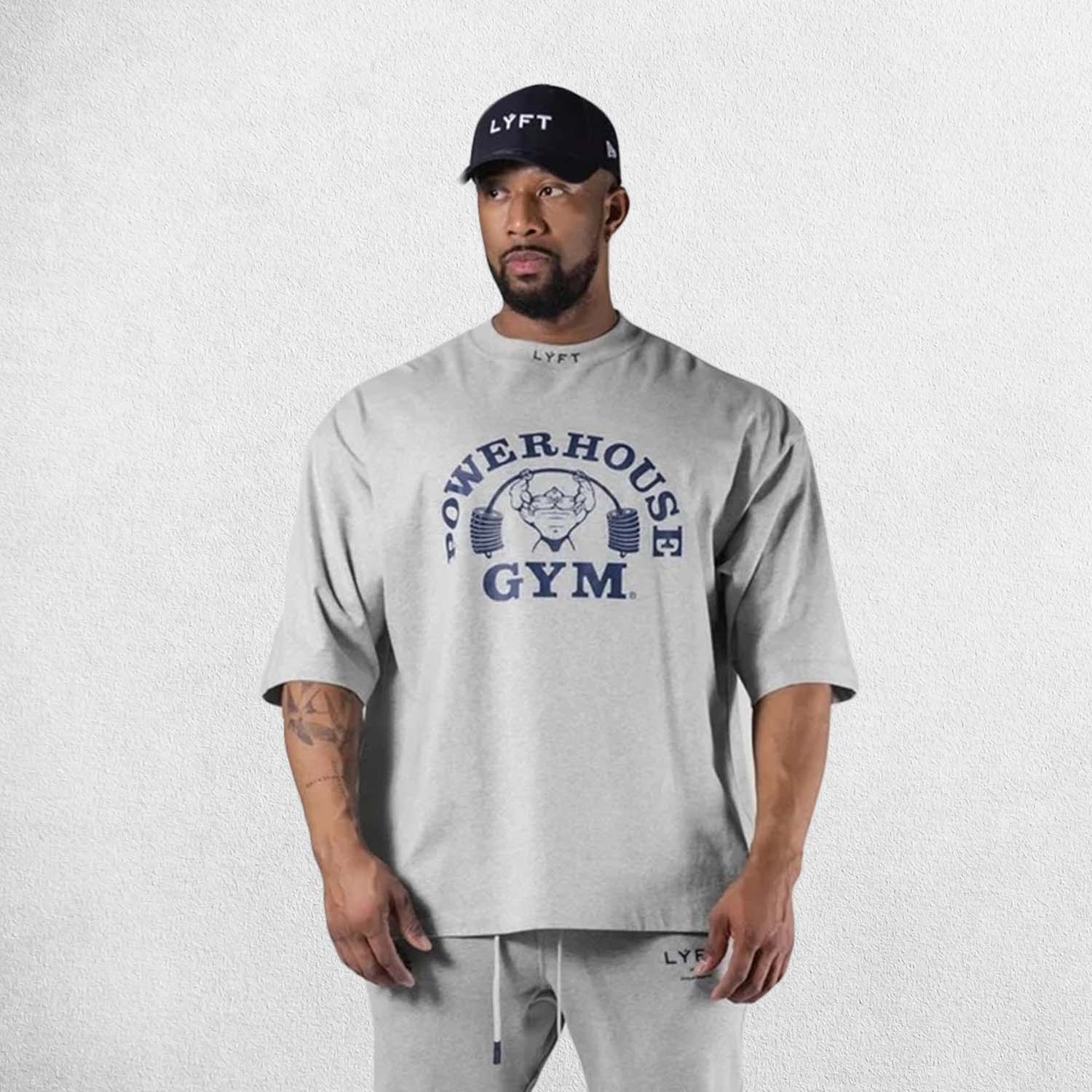 ront View of Model Wearing White Men's Casual Loose Oversized Cotton Printed T-shirt – Breathable & Stylish Workout Tee