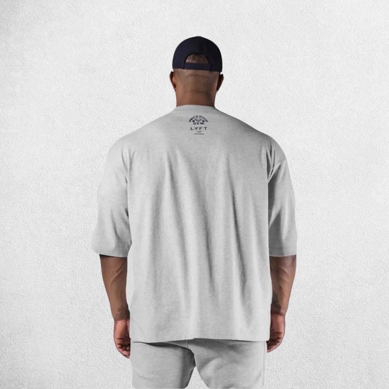 Back View of Model Wearing Grey Men's Casual Loose Oversized Cotton Printed T-shirt – Breathable & Stylish Workout Tee