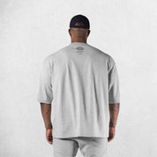 Back View of Model Wearing Grey Men's Casual Loose Oversized Cotton Printed T-shirt – Breathable & Stylish Workout Tee