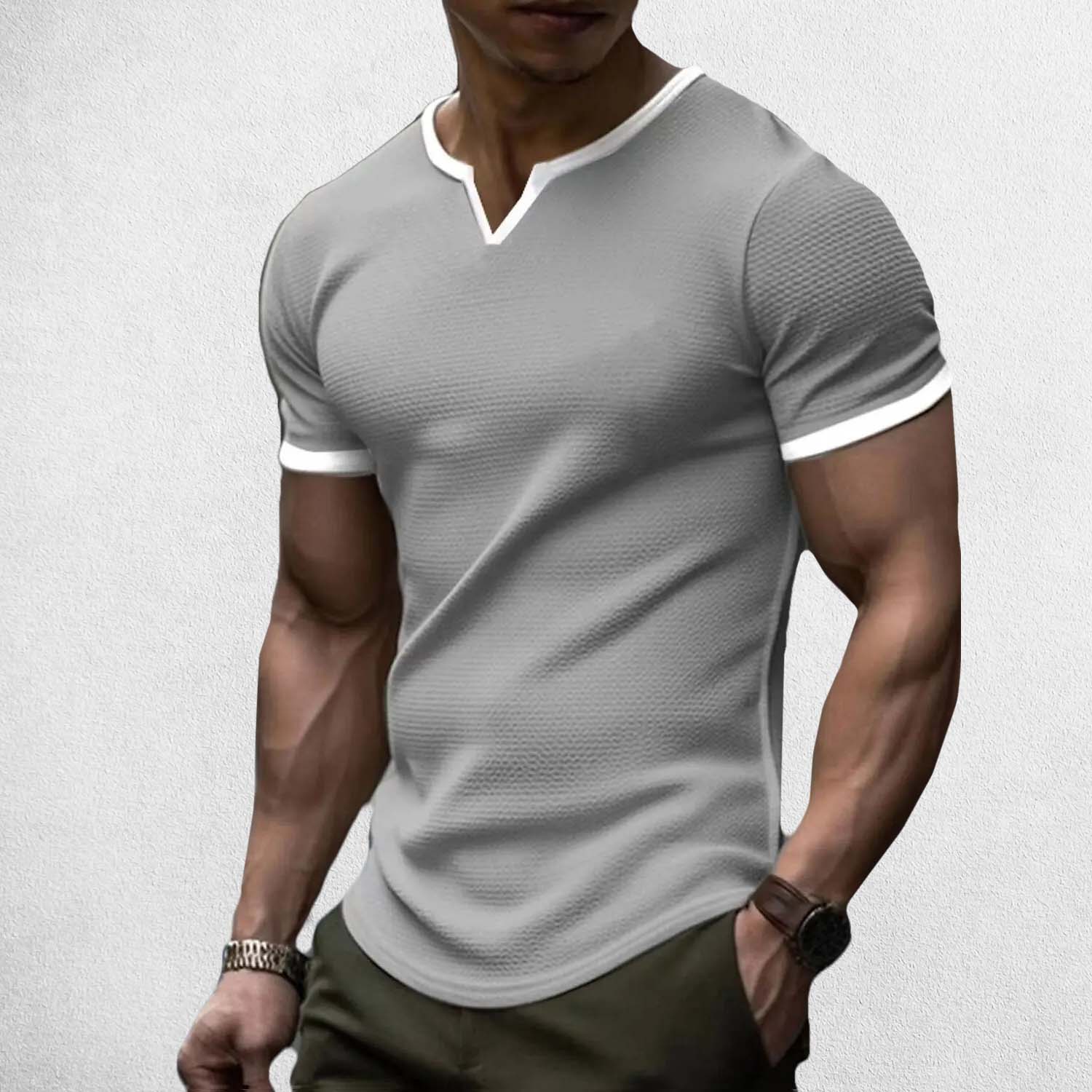 Model Wearing Grey Men’s Casual Slim Fit V-Neck Waffle Solid Color Short Sleeve T-Shirt for Summer In a studio background