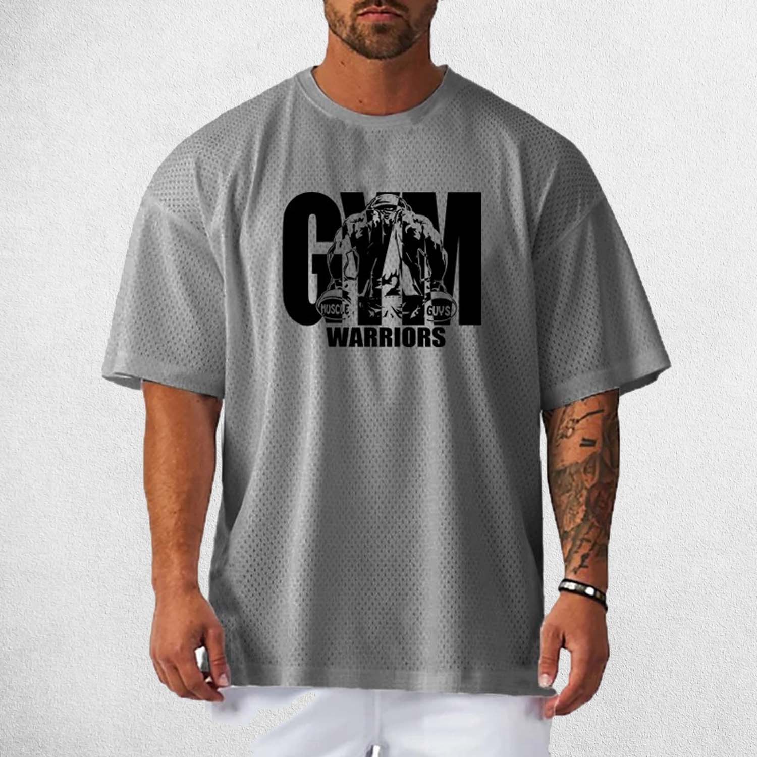 Front View of Model Wearing Grey Men's Oversized Gym T-Shirt – Breathable, Quick-Drying & Lightweight Training Tee