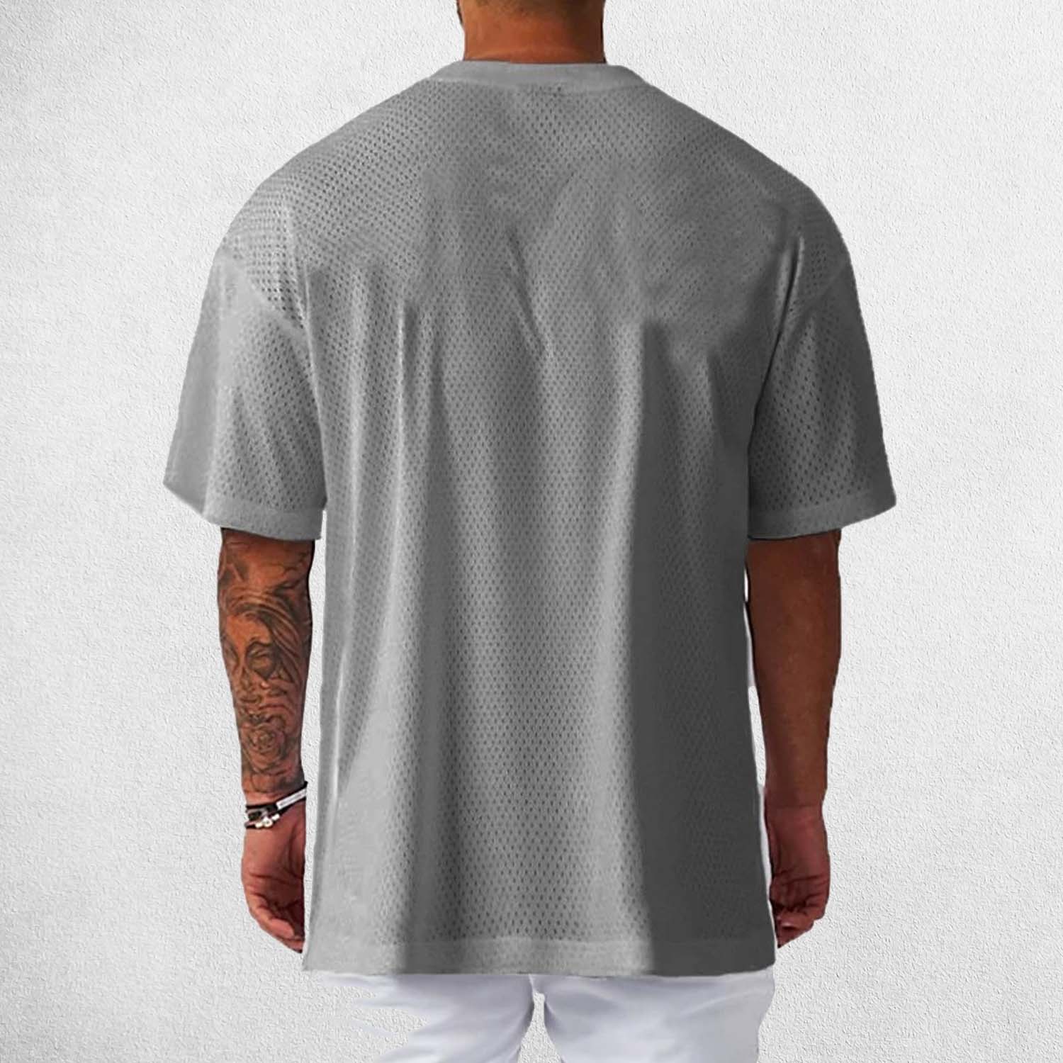 Back View of Model Wearing Grey Men's Oversized Gym T-Shirt – Breathable, Quick-Drying & Lightweight Training Tee