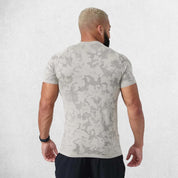 Back view of the shirt, highlighting its compression fit and moisture-wicking design for intense workouts.