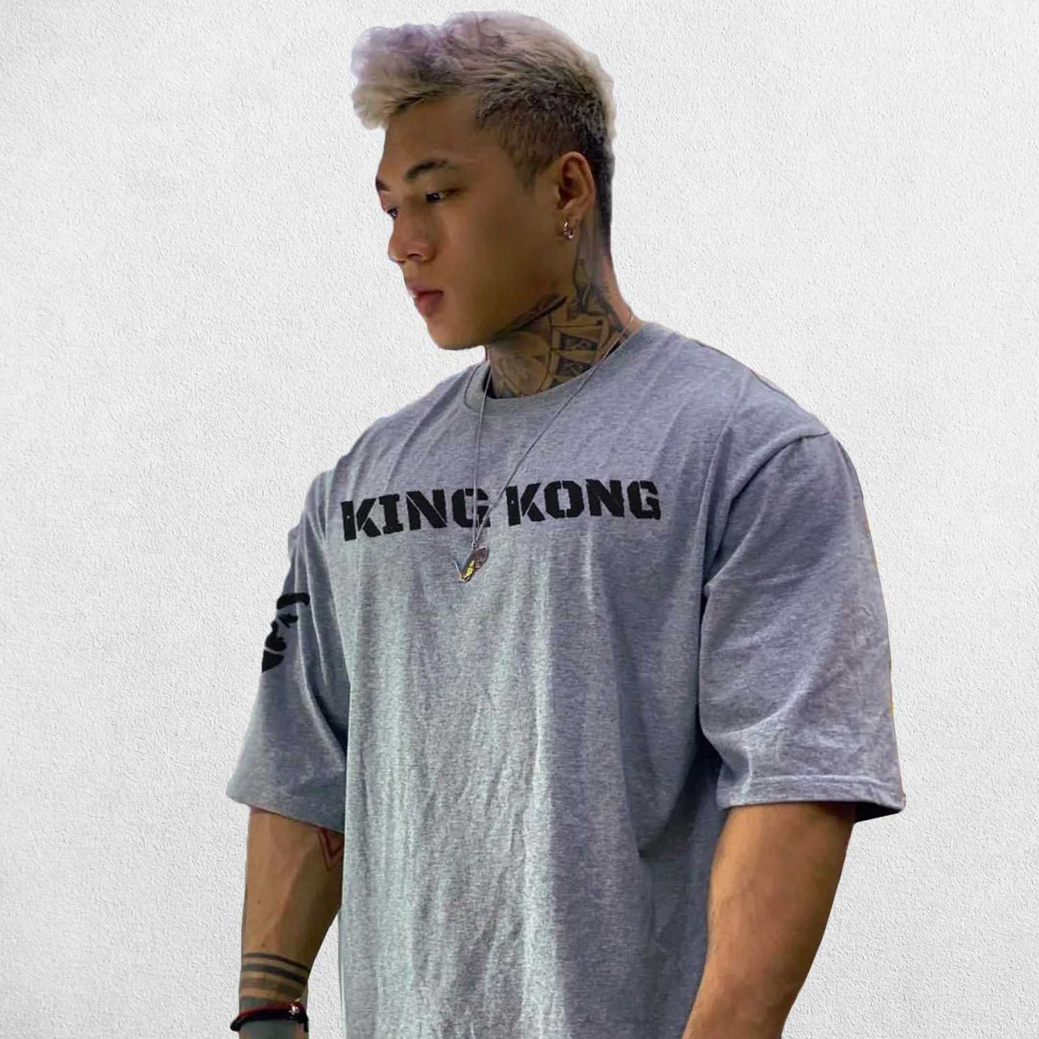 Close-up of Grey breathable cotton fabric texture for the King Kong Print T-Shirt.