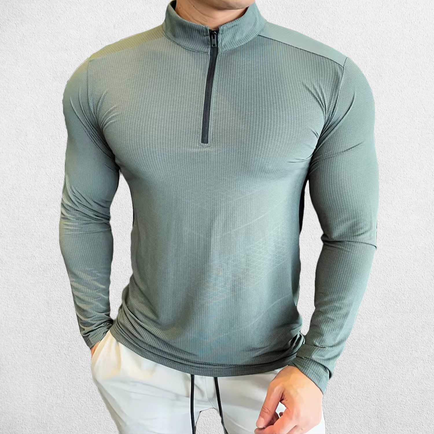 Front Pose of Model wearing Light Green Men's Activewear Sweat-Wicking High Collar Compression Top with Long Sleeves