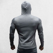 Model wearing Light Grey Athletic Fit Fitness Hoodie Top For Running, Bodybuilding, and Fitness