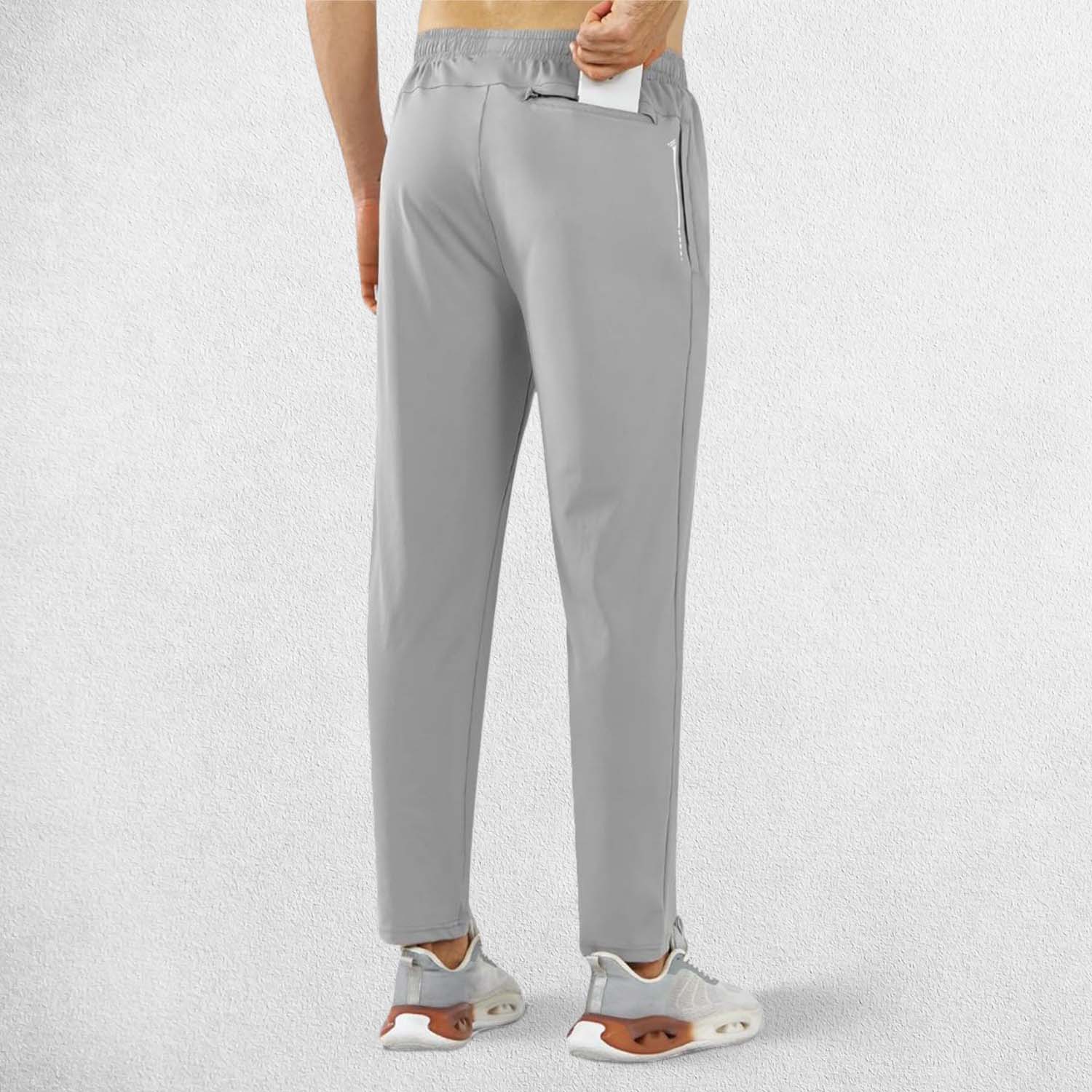 Back pose of Model Wearing Light Grey GPW Men’s Lightweight Athletic Joggers with Zipper Pockets for Gym & Running