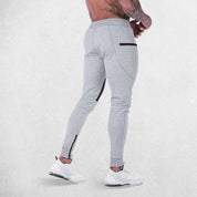 Close-up of breathable mesh fabric texture in GPW training pants.