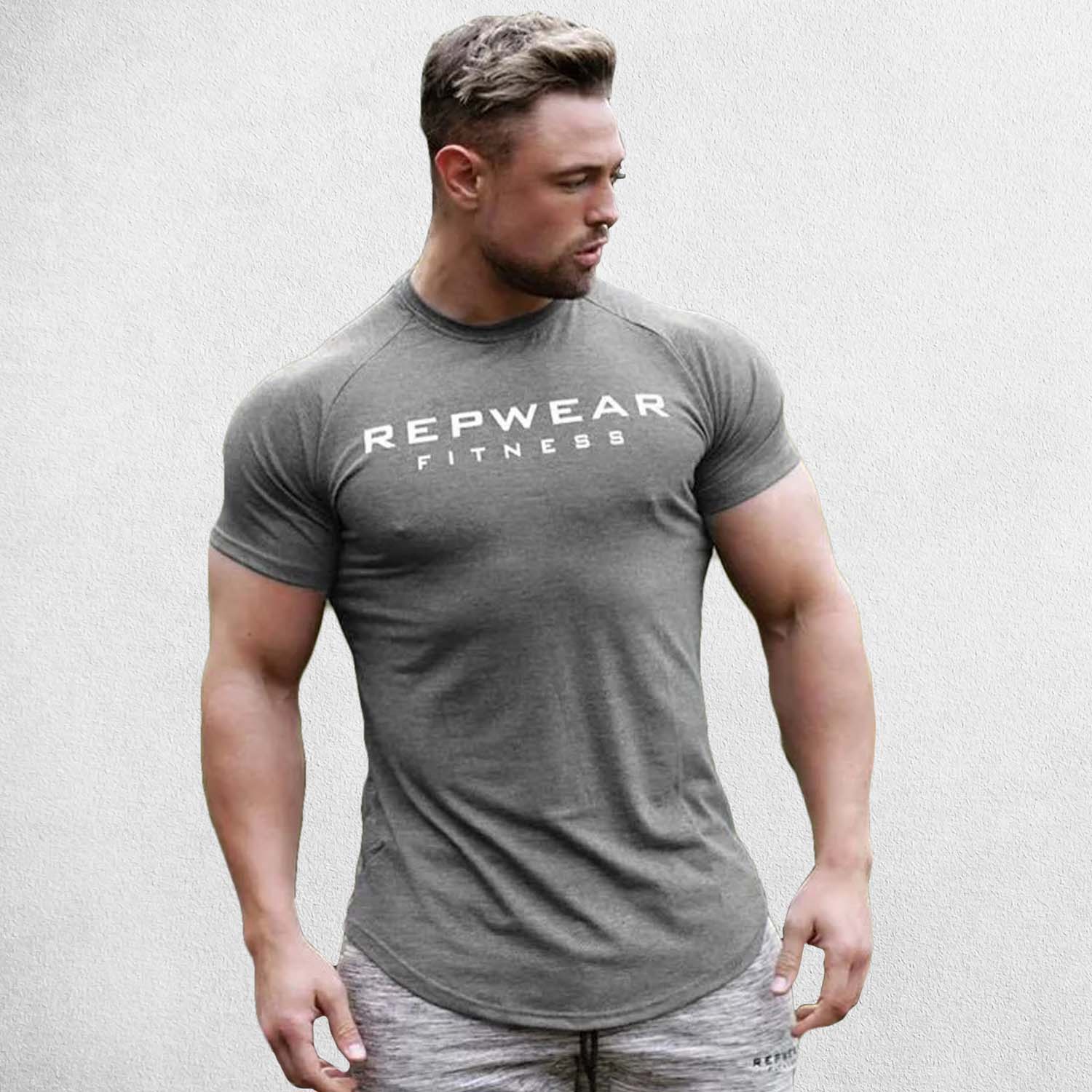 Front Pose of Model wearing Light Grey Men’s Athletic Fit Gym T-Shirt – Breathable Cotton Workout Shirt for Training & Casual Wear