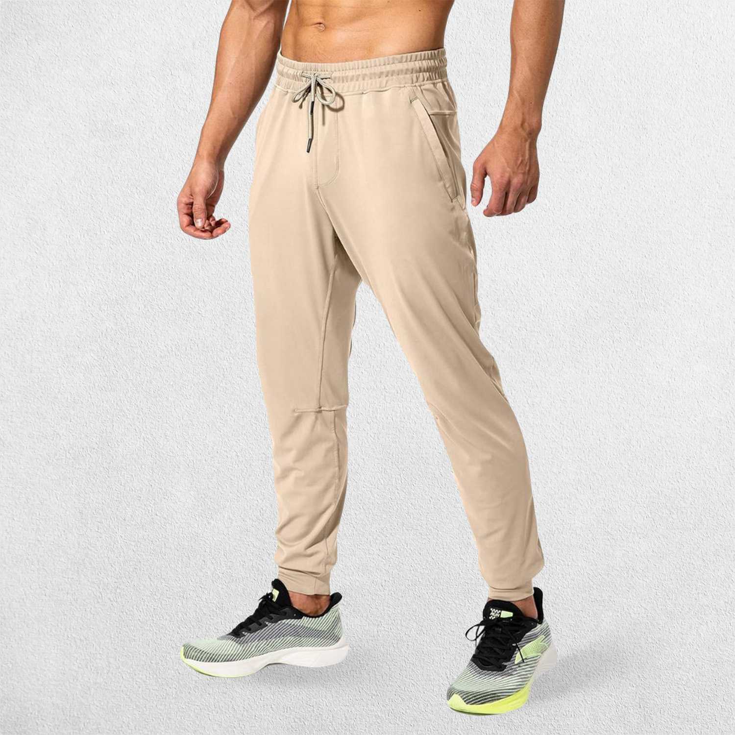 Light Khaki GPW Men's Athletic Sweatpants featuring zipper pockets, athletic fit, and sleek design.