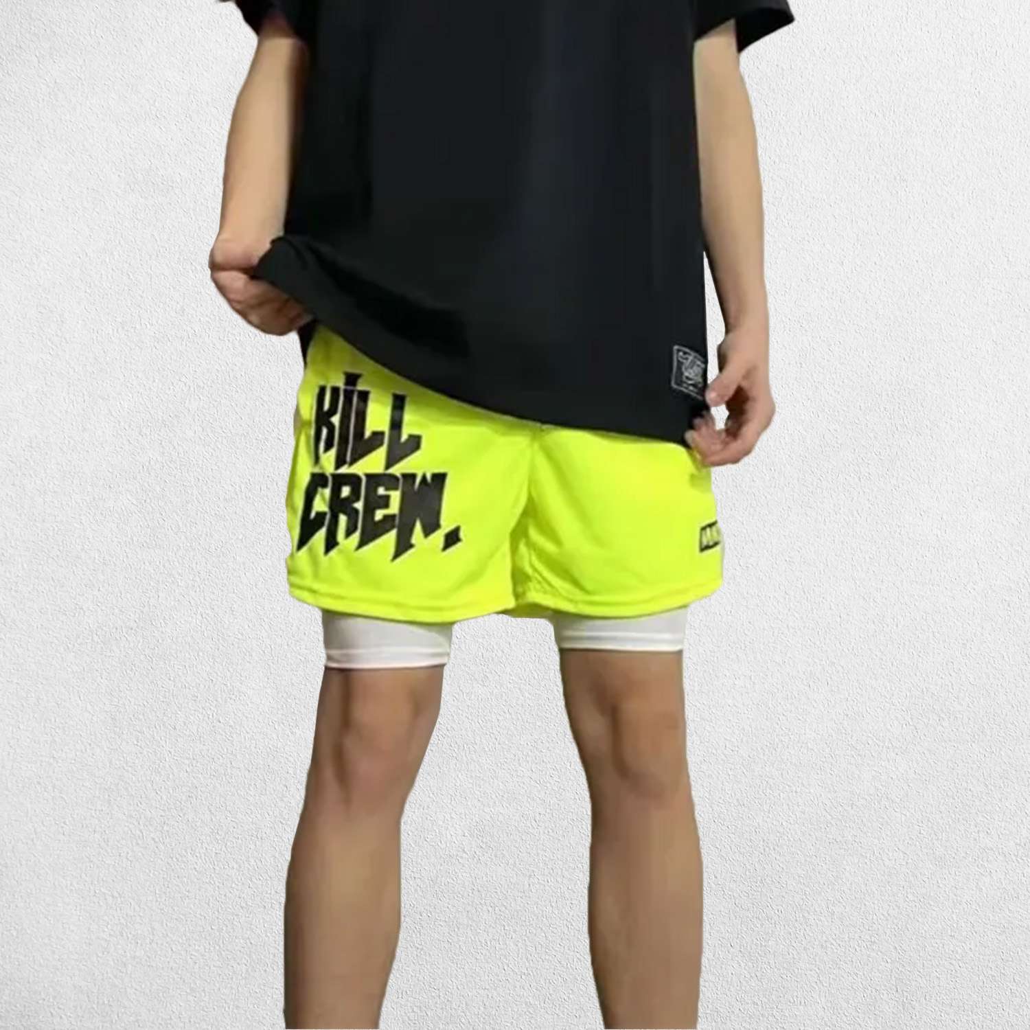 Model wearing Lime GPW Men's Kill Crew Printed Breathable Mesh Fabric Bodybuilding Shorts for Gym in astudio background