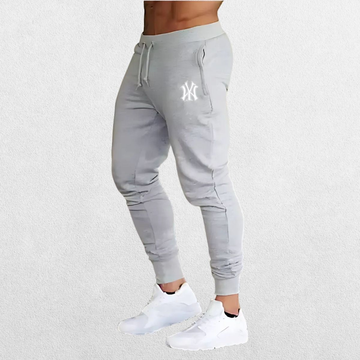 Man Pants Summer Casual Trousers in dim grey, offering a sleek, modern look with moisture-wicking fabric for comfort during training.