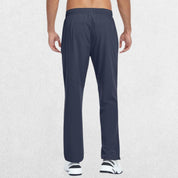Back view of men's navy lightweight quick-dry hiking trousers in studio setting, showcasing durable and breathable fabric