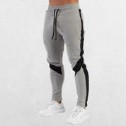 Men’s Casual Sports Jogger Sweatpants in dim grey, side view highlighting modern fit and pocket design.