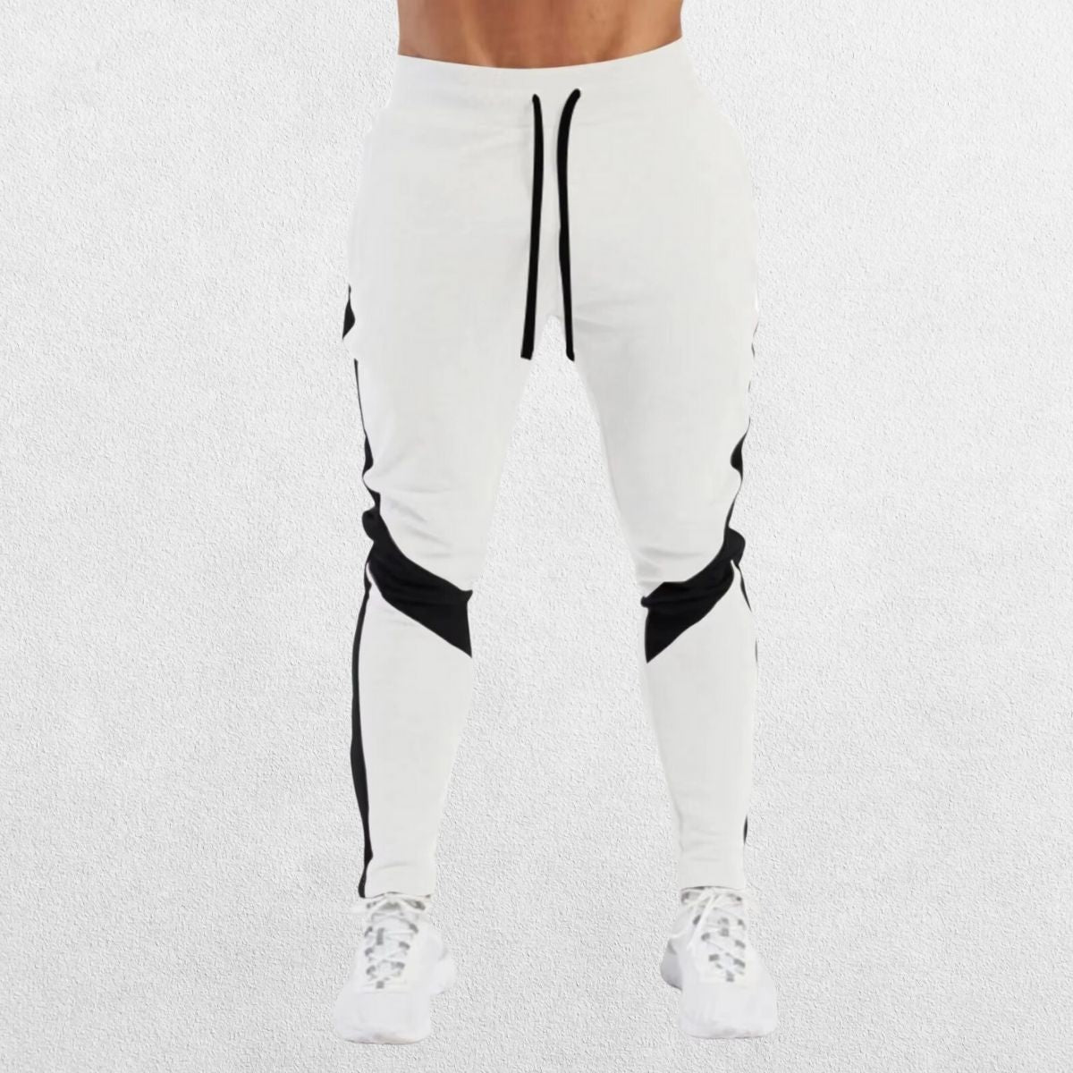Men’s Casual Sports Jogger Sweatpants in white, angled view emphasizing versatility and sleek design.